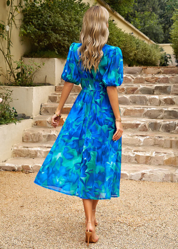 Estella™ | Flatterende Blomster Midi Kjole