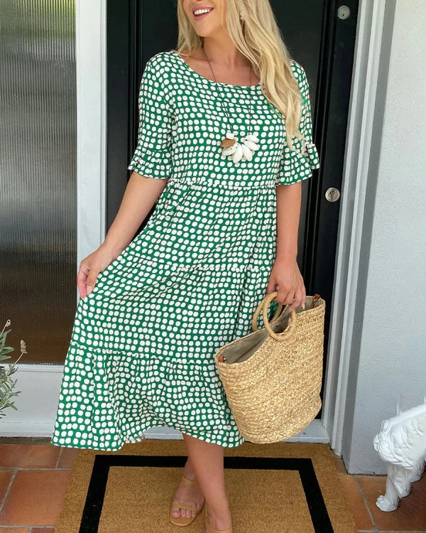 Jessika | Elegant midikjole med lekne volangdetaljer