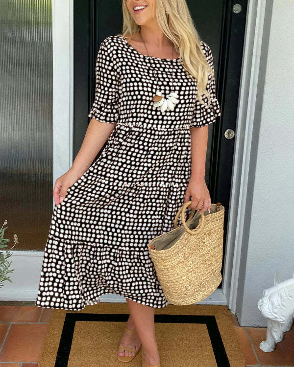 Jessika | Elegant midikjole med lekne volangdetaljer